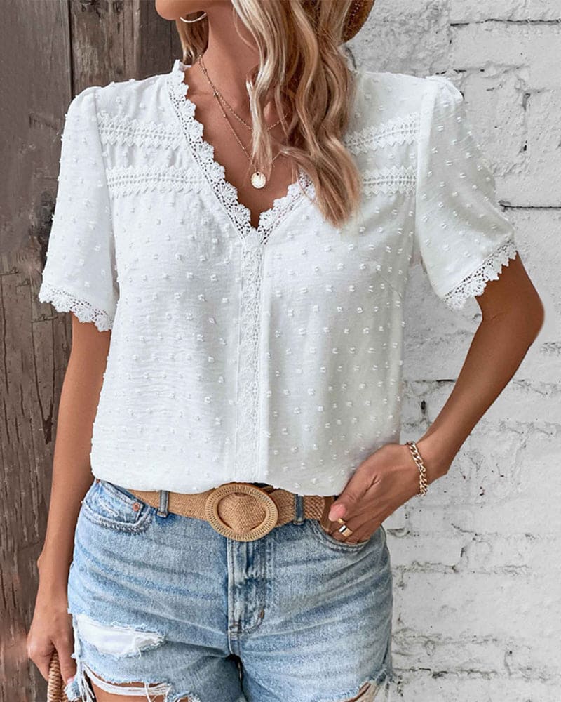 Elegant spetsblus med V-ringning 1