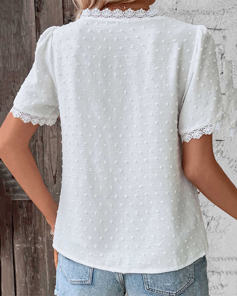 Elegant spetsblus med V-ringning 2