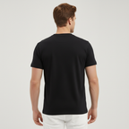 T-shirt med knappar och bekväm passform